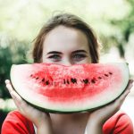 Improve nutrition be happy woman watermelon