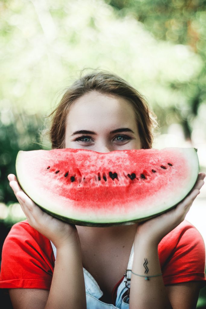 Improve nutrition be happy woman watermelon