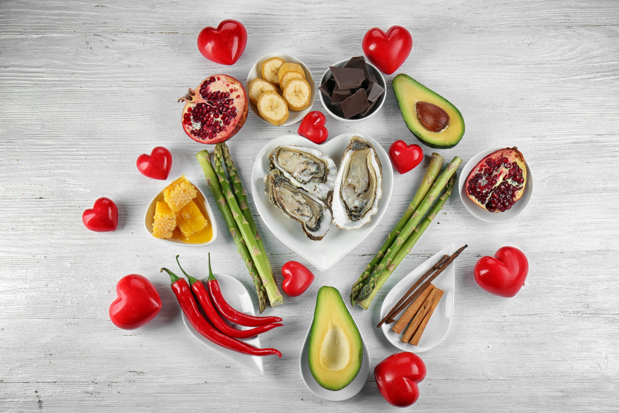 Different aphrodisiac food for increasing sexual desire on wooden table